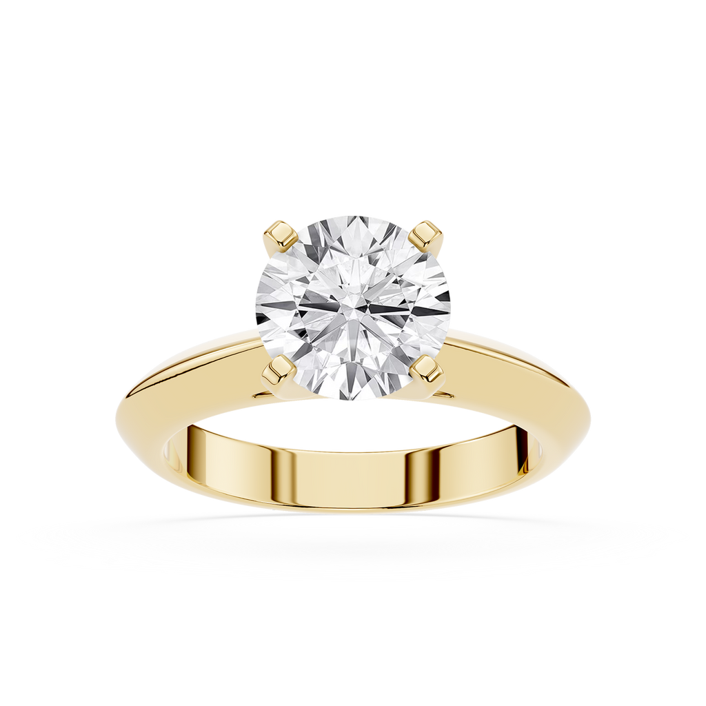 Gold ring with a large diamond on a white background