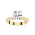 Gold ring with a large diamond on a white background