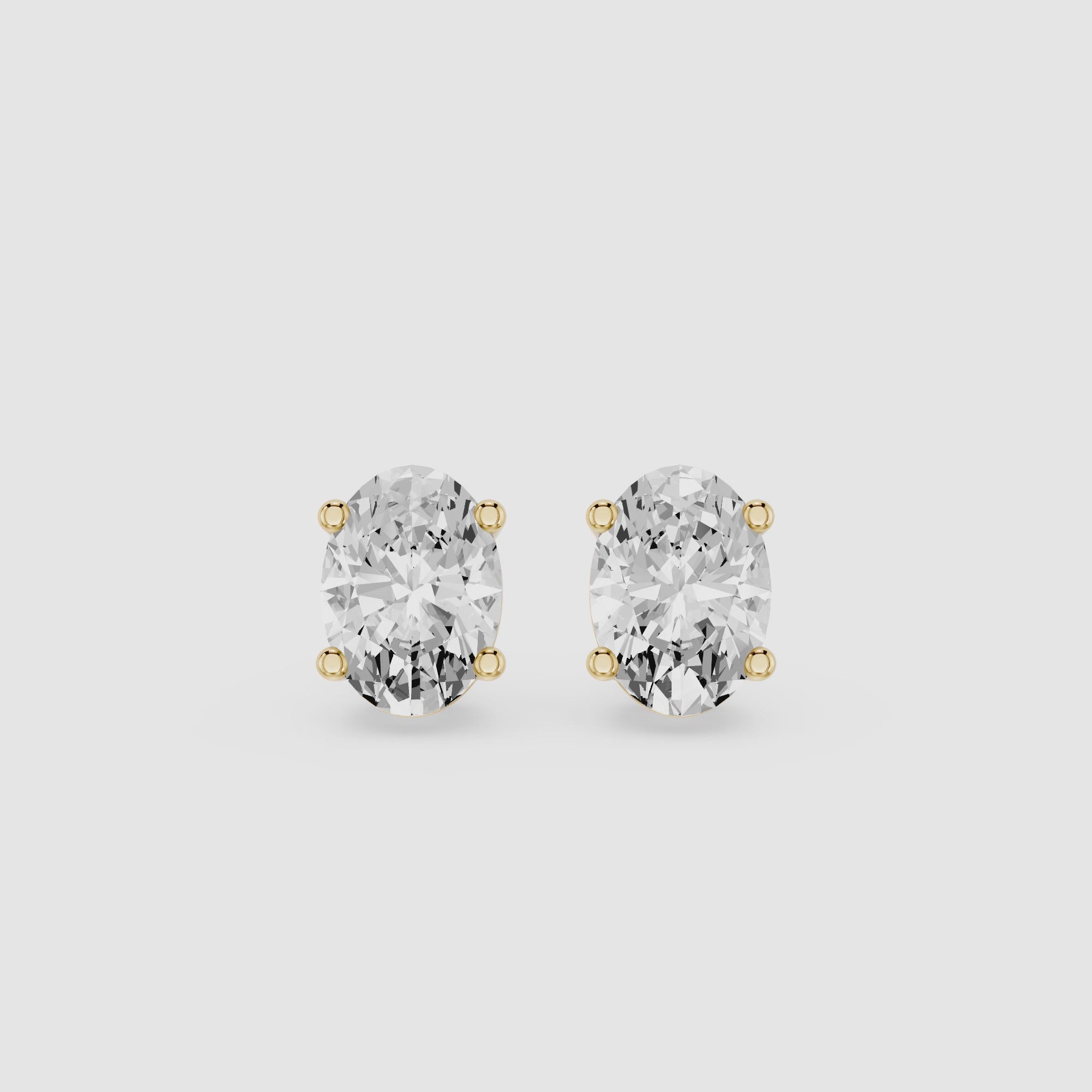 Oval Cut Lab Diamond Four Prong Stud Earrings