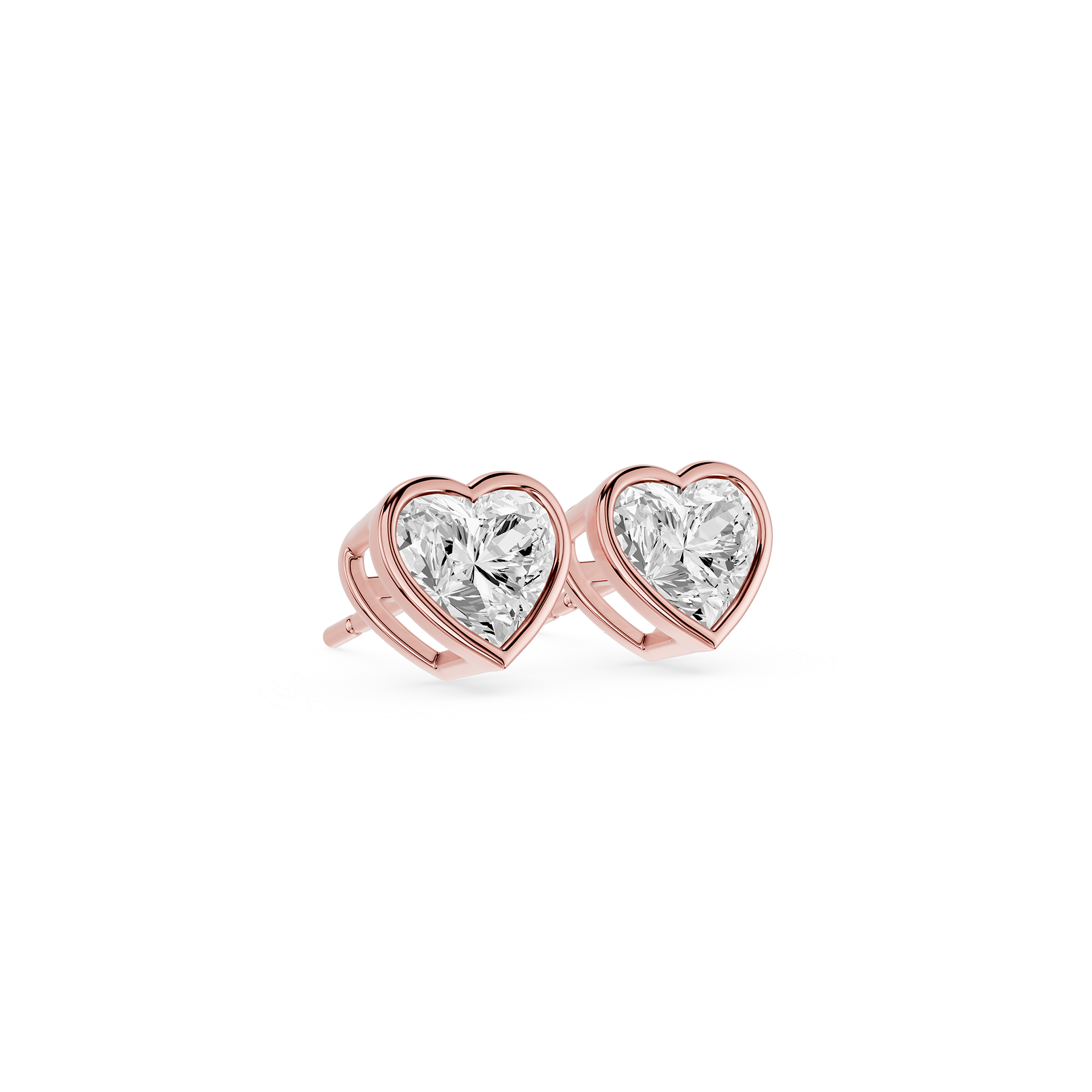 Heart-shaped diamond earrings with rose gold setting on a white background